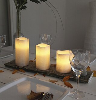 Vaxljus Silver 12,5 cm från Star Trading på rustikt träfat