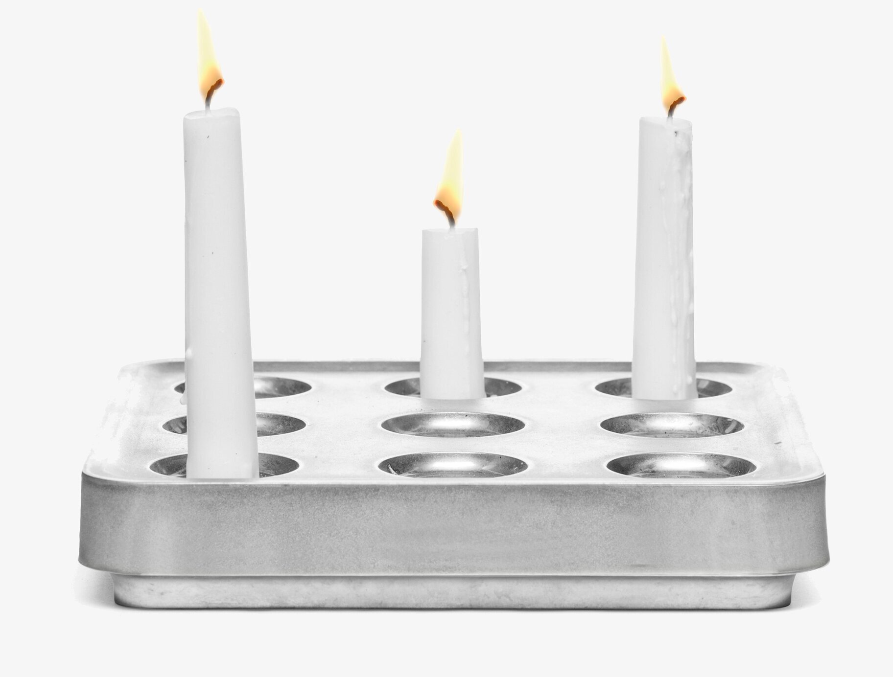 Stumpastaken Small från Stumpastaken med tända ljusstumpar