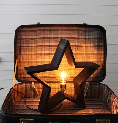 LYSeKIL Stjärna Svart från Star Trading i en öppen resväska