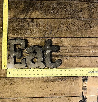 Skylt Eat Typewriter Font från Americana Classic Vintage