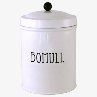 Bild av vit plåtburk med texten BOMULL i klassisk stil