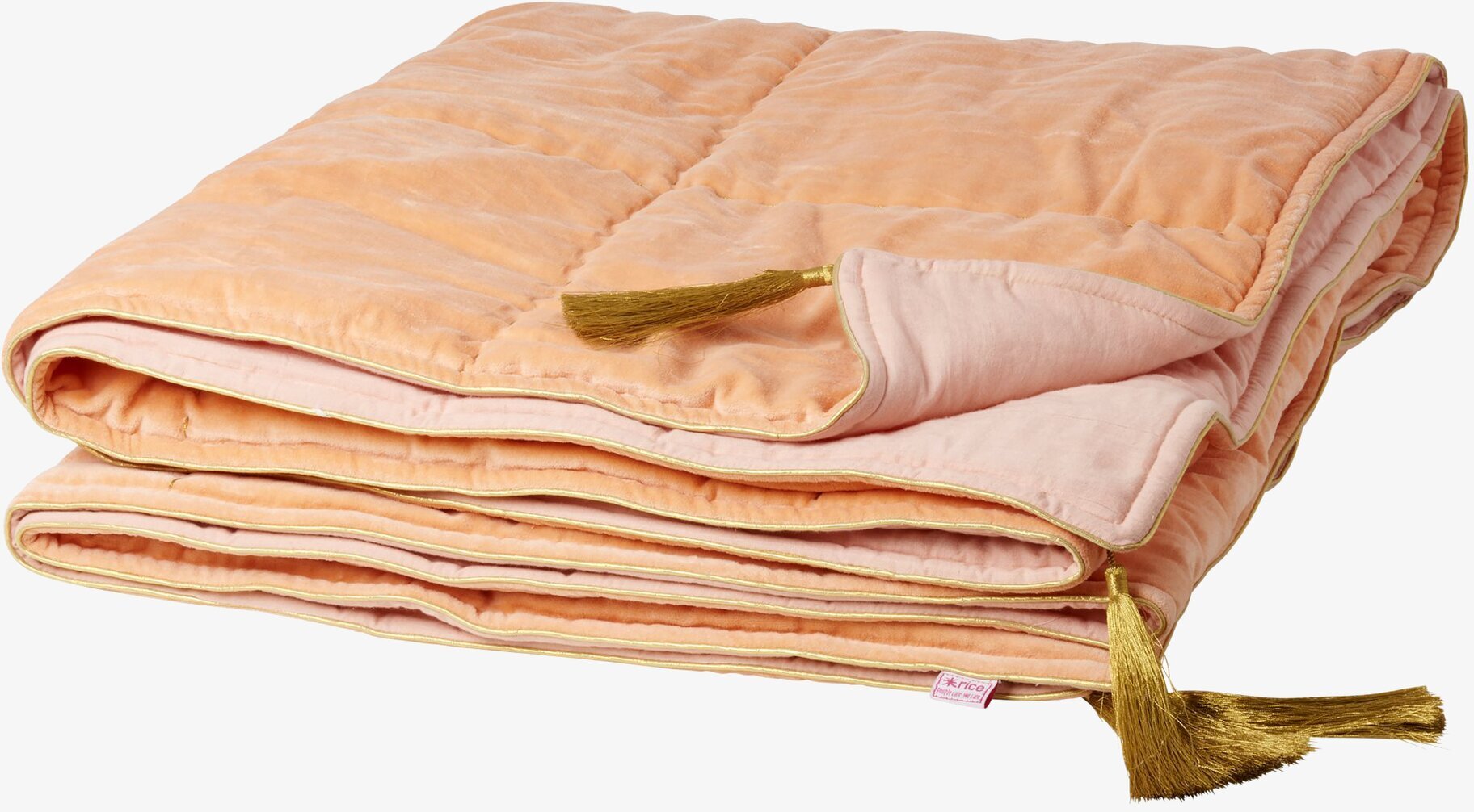 Sammetsfilt Korall från Rice med gyllene tofsar och paneler