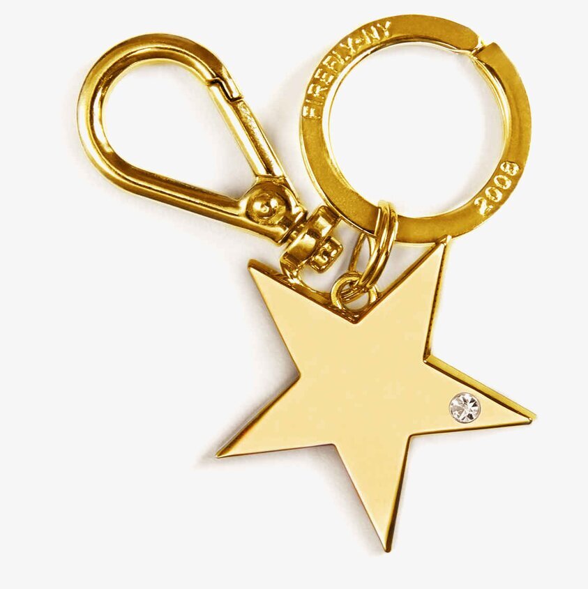Bag Charms Star Gold från Firefly på vit bakgrund
