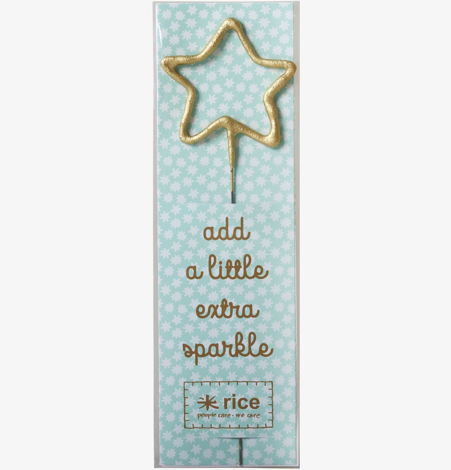 Tomtebloss Star från Rice med stjärnformad guldfärgad yta