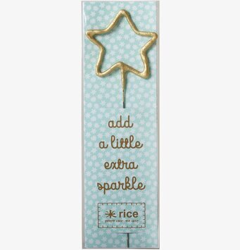 Tomtebloss Star från Rice med stjärnformad guldfärgad yta