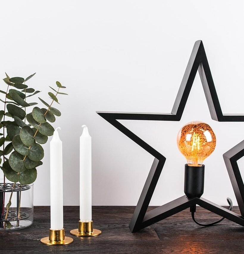 Trästjärna Svart från Havsö med ljus och eukalyptusblad