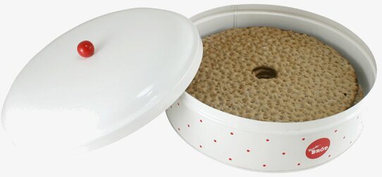 Bild av rund plåtburk för knäckebröd i rött och vitt