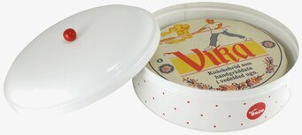 Foto av rund plåtburk för knäckebröd med retrodesign