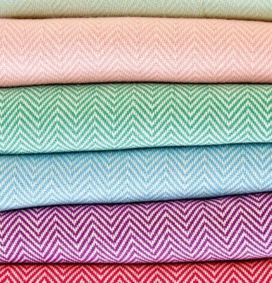 Hamam Handduk Pastellrosa från Rice i en prydlig hög