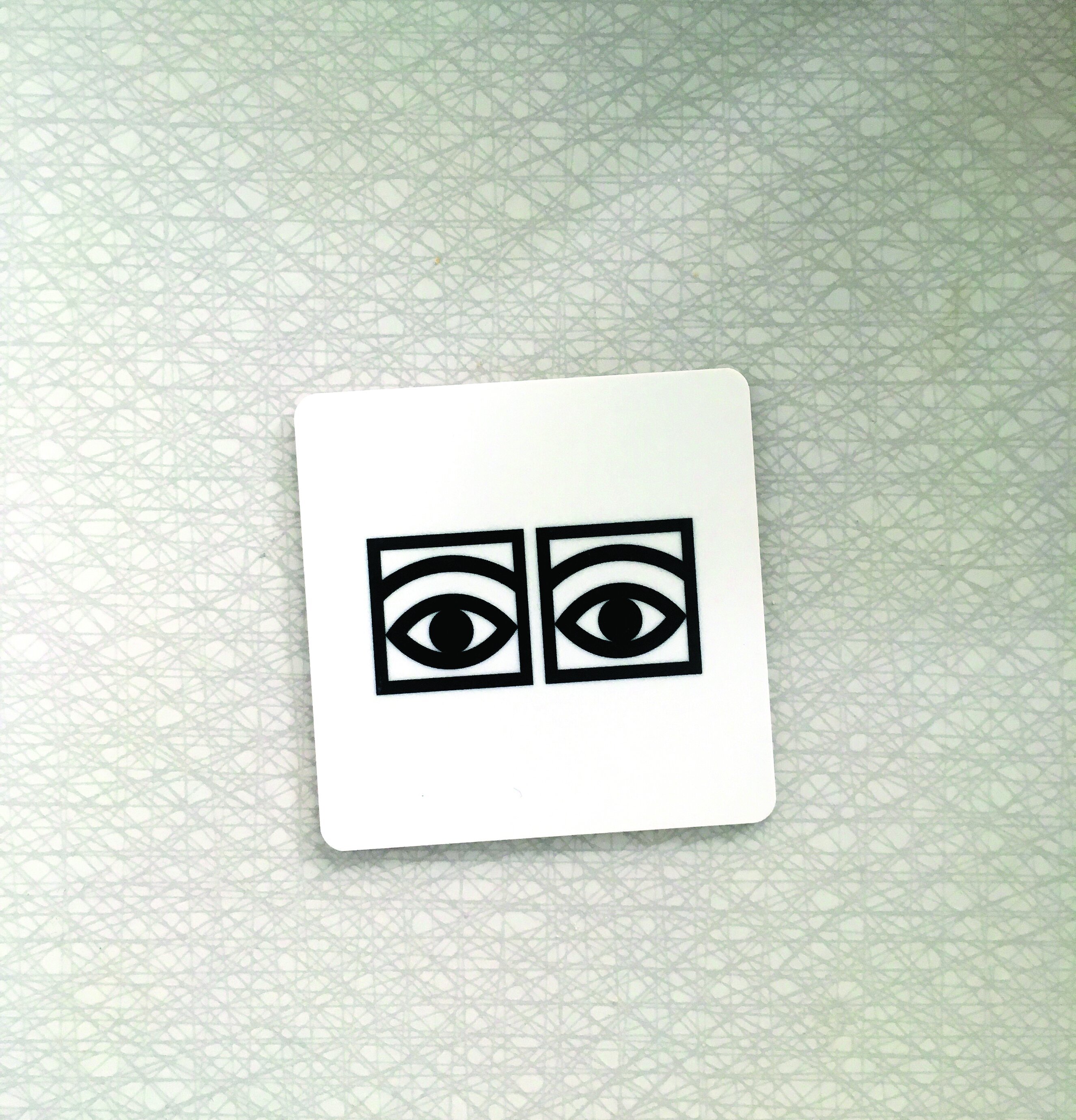 Glasunderlägg Ögon Cacao från Olle Eksell med ikoniska ögon