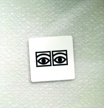 Glasunderlägg Ögon Cacao från Olle Eksell med ikoniska ögon