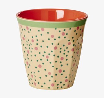 Bild av färgglad mugg med prickar och unik design