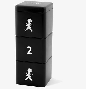 Bild av stilren mattsvart förvaringsburk med design