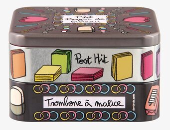 Bild av färgglad plåtburk med livfulla illustrationer