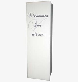 Bild av elegant nyckelskåp med välkomnande text