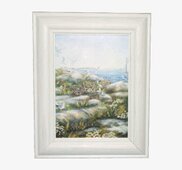 Bild av charmfullt nyckelskåp med kustlandskapmotiv