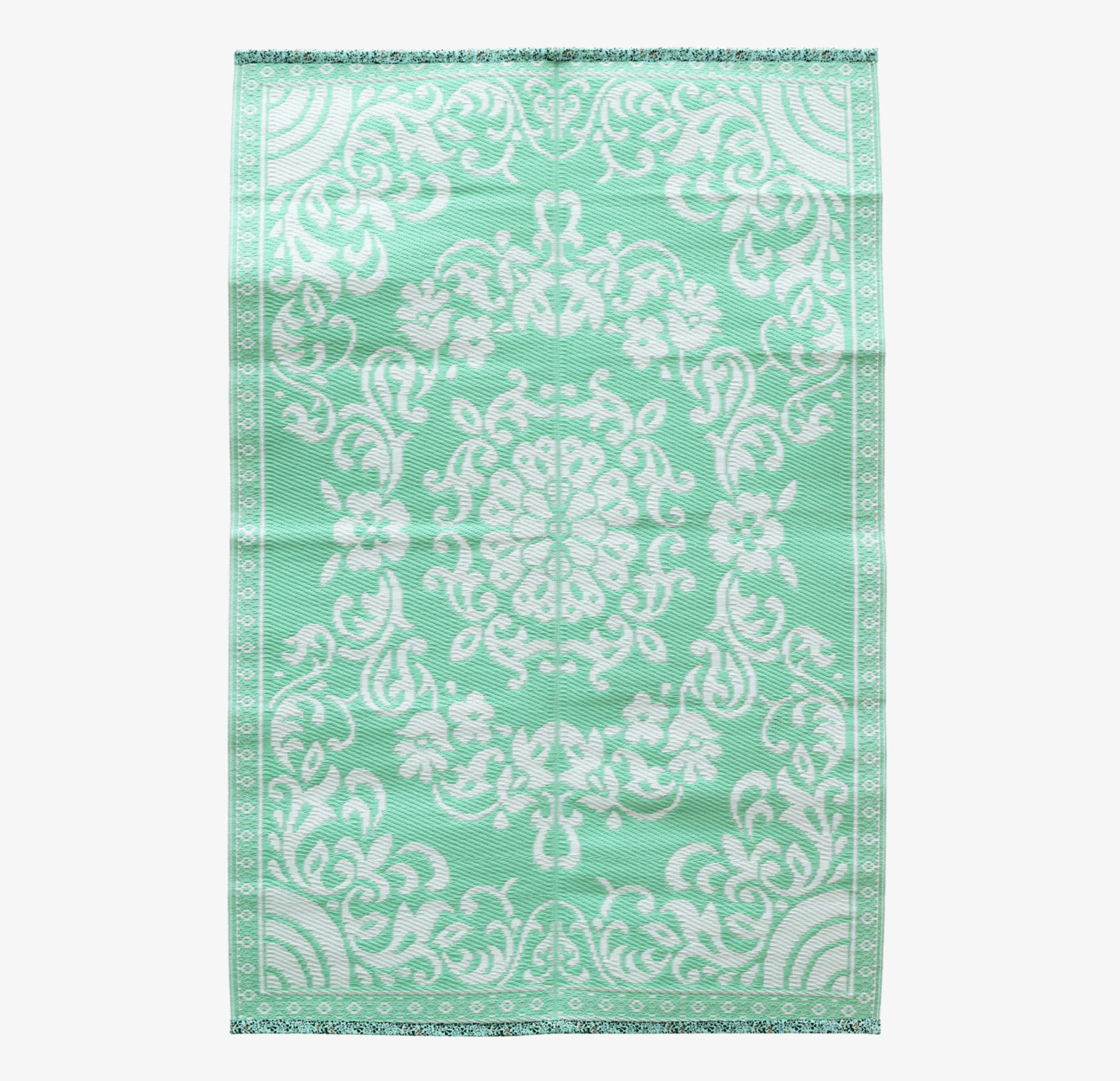 Matta Circle Flower Design Medium från Rice i mintgrönt
