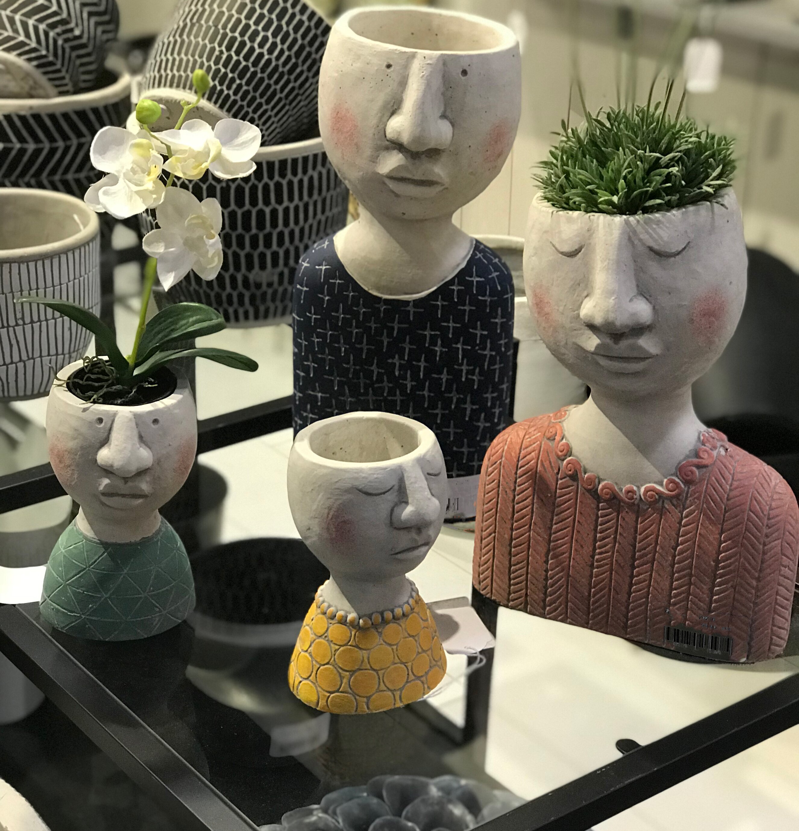 Kruka Ansikte Grön från Multi Agentur i butiksmiljö