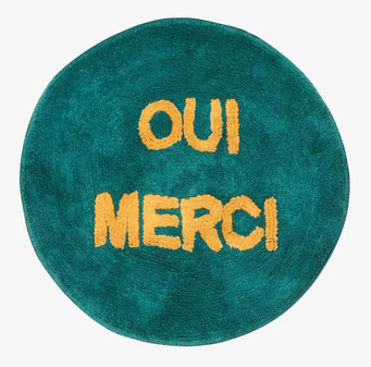 Matta - Oui Merci från Rice, rund och färgstark med text