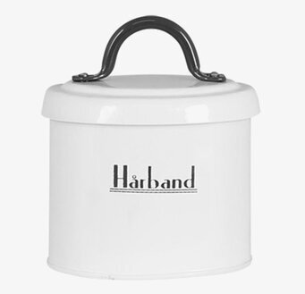 Foto av stilren och funktionell plåtburk för hårband