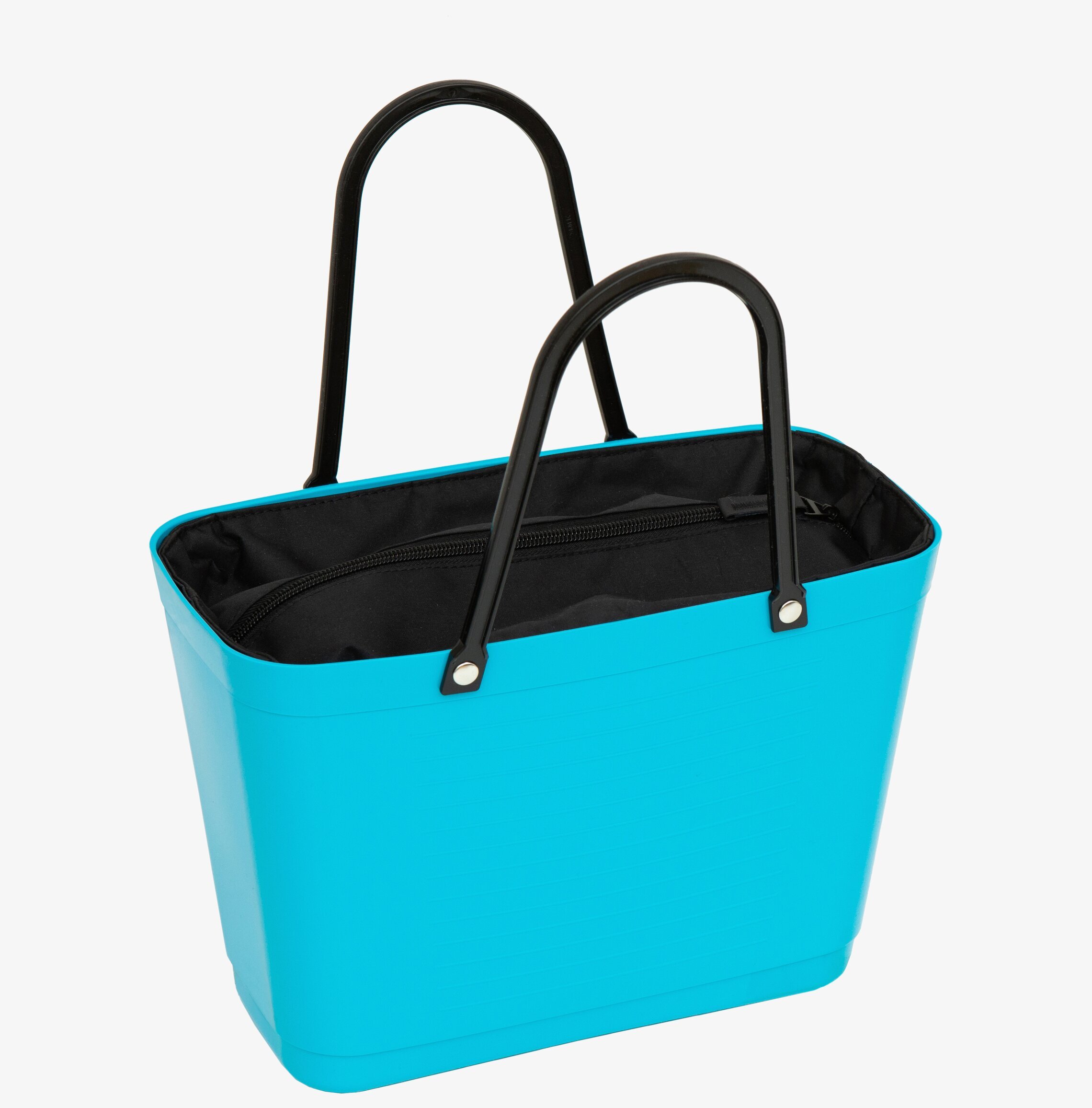 Hinza Innerväska Liten Svart från Hinza i en turkos väska