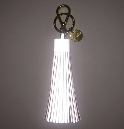 Mjuk Reflextofs Dusty Rose från Firefly med reflekterande remsor