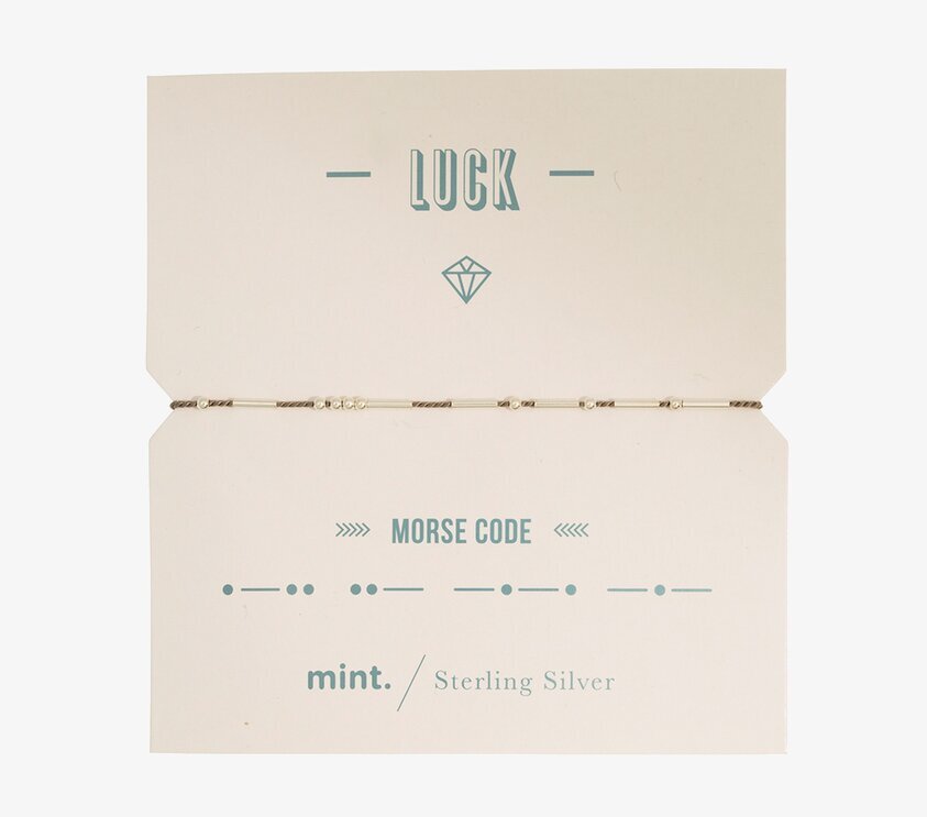 Armband LUCK - Morse Code från Timi of Sweden på vit kartong