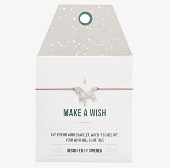 Armband Unicorn från Timi of Sweden på vit kartongförpackning