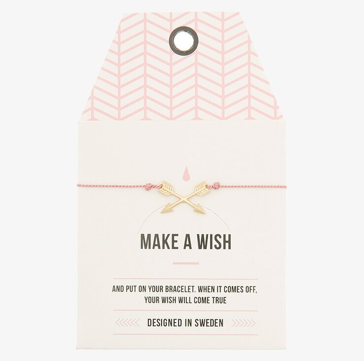 Armband Cross Arrow från Timi of Sweden på ljusrosa kort