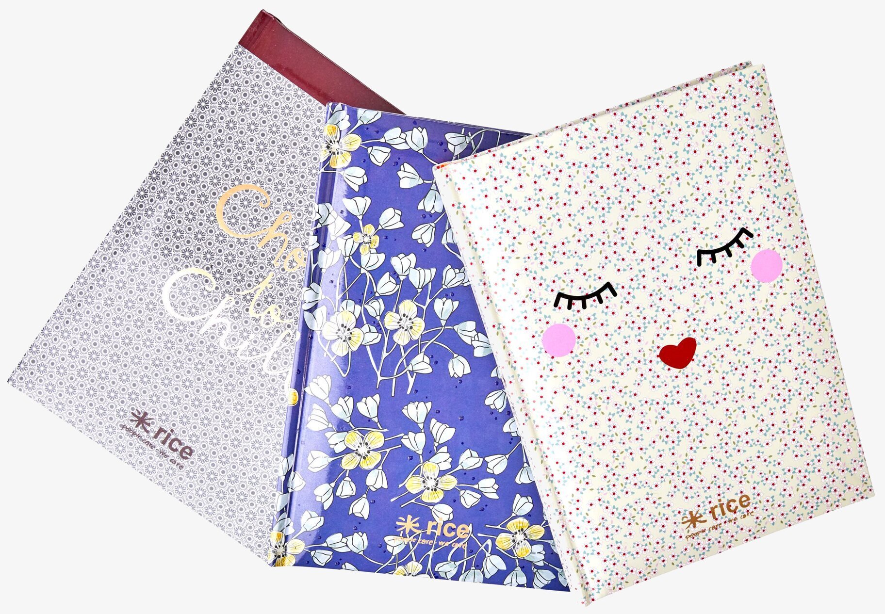 Tre designvarianter av Skrivbok A5 Rice från varumärket Rice