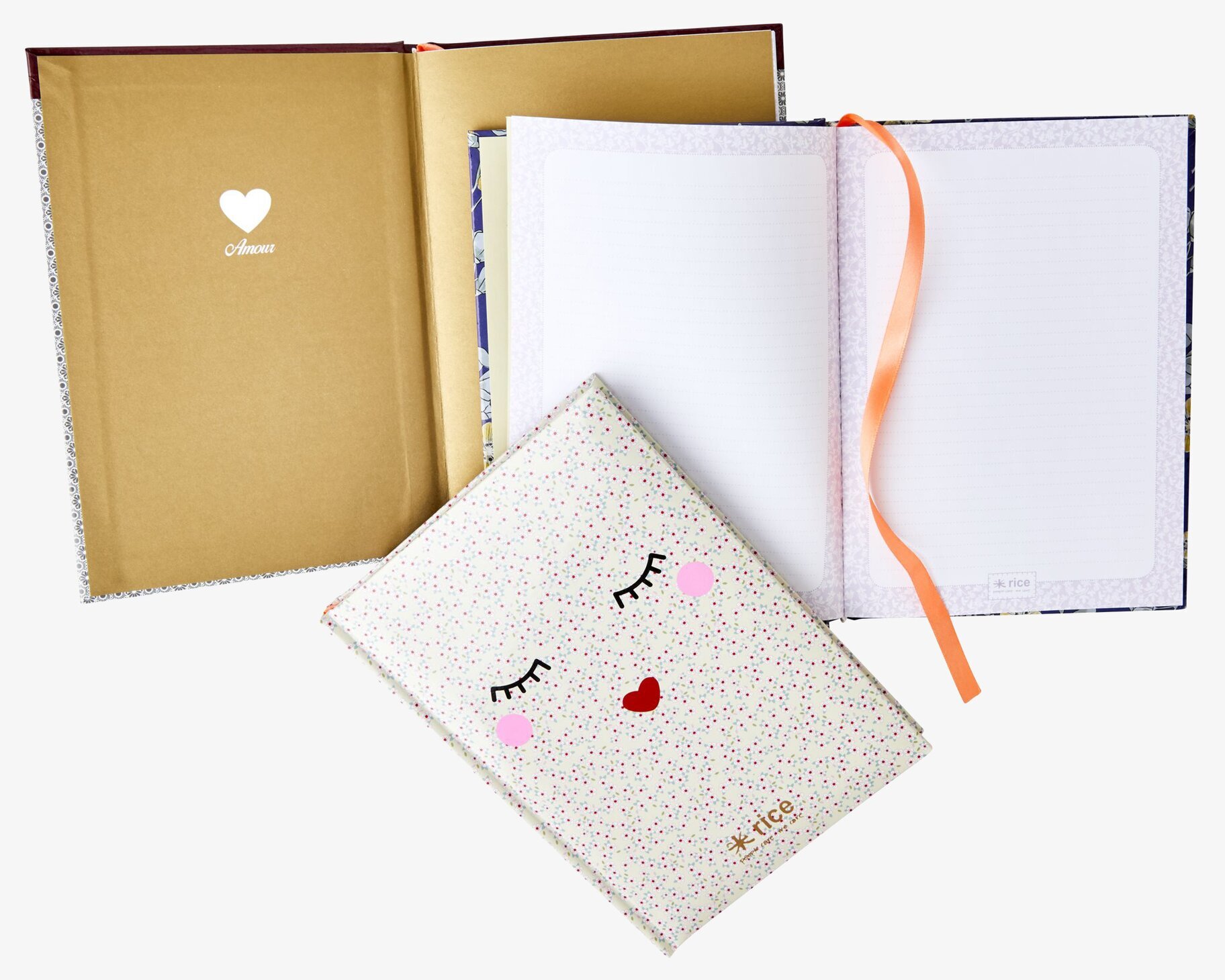 Skrivbok A5 Rice från Rice med lekfullt ansikte och hjärta