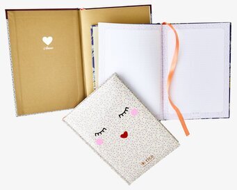 Skrivbok A5 Rice från Rice med lekfullt ansikte och hjärta