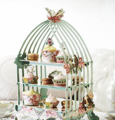 Kakfat Fågelbur från Talking Tables på ett dukat bord