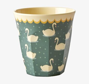 Bild av mugg med svanmönster i kakifärg och guldkant