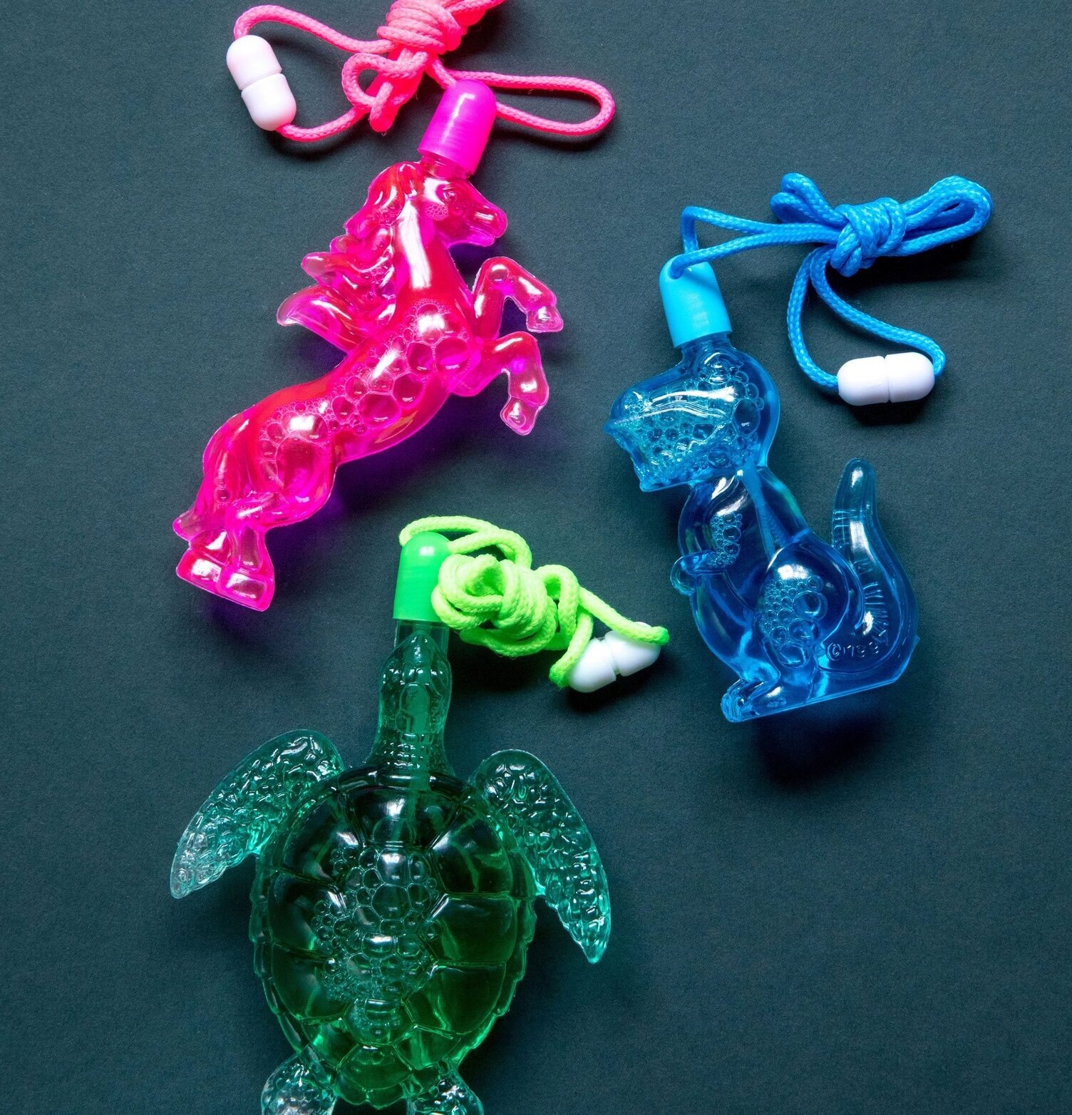 Såpbubblor från Rice i form av häst, dinosaurie och sköldpadda