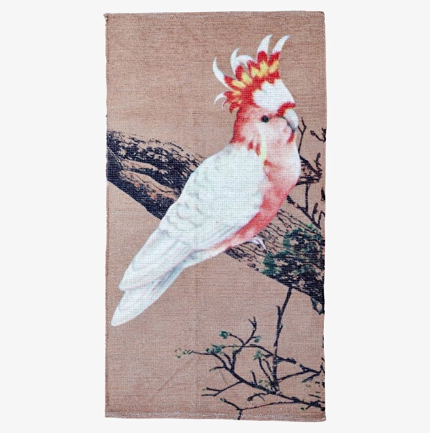 Matta Cockatoo från Rice med färgglad kakadua på beige botten