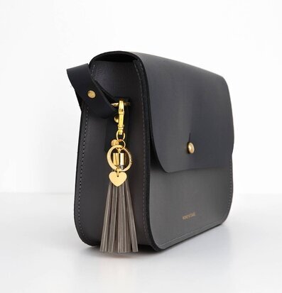 Reflextofs Taupe Gold Deluxe från Firefly på mörk väska