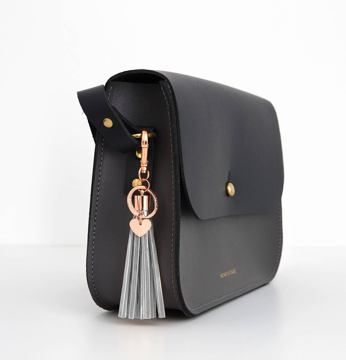 Reflextofs Grey Sky Deluxe Rose Gold från Firefly på väska