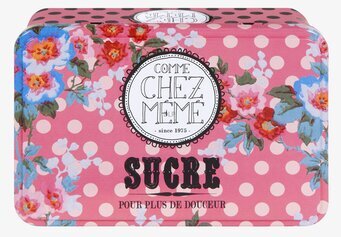 Bild av retroinspirerad rosa plåtburk med blommönster