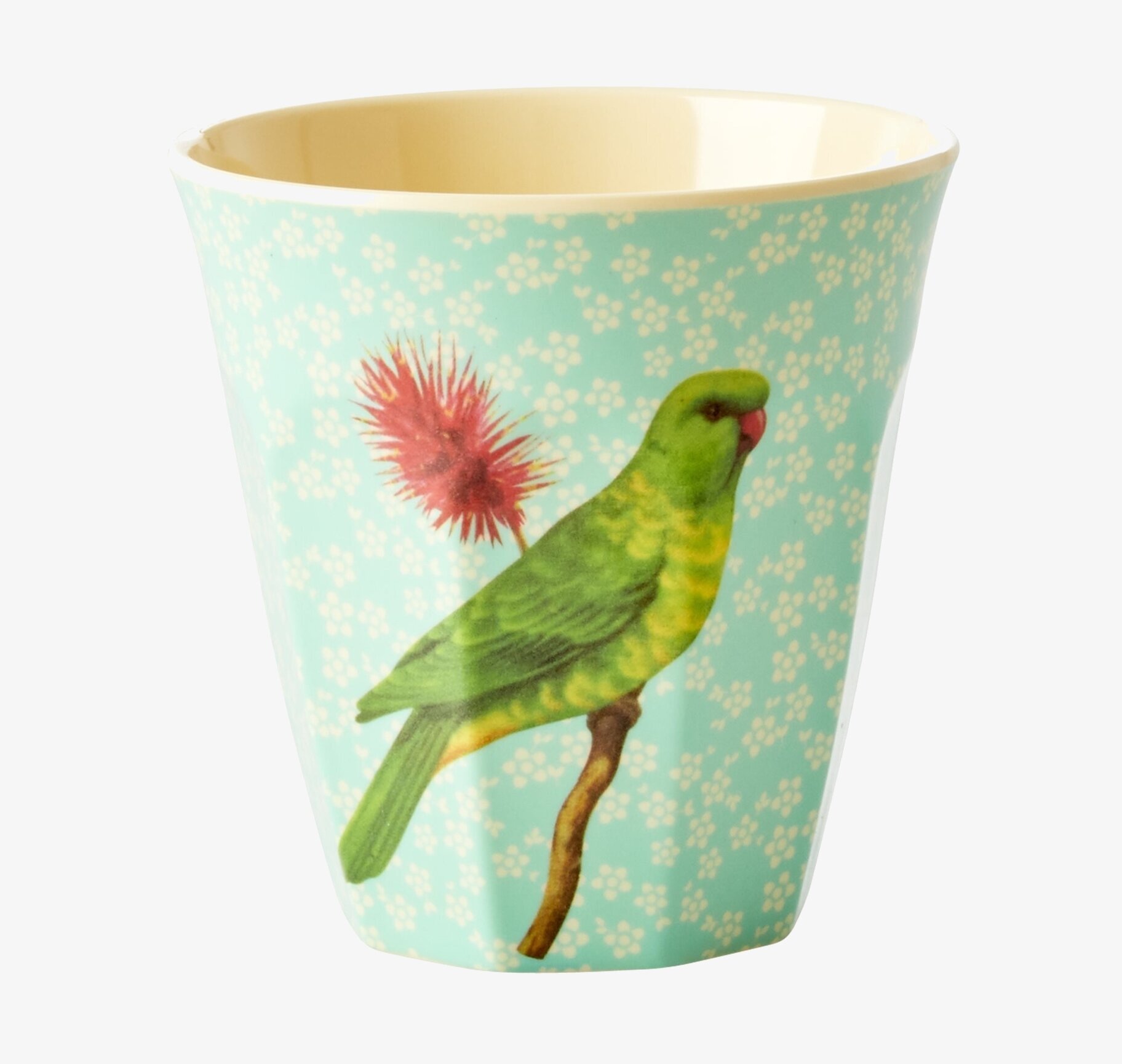 Bild av mugg med fågelmotiv och livfull design