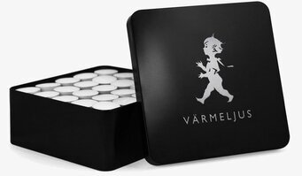 Bild av stilren plåtburk för värmeljus i svart design