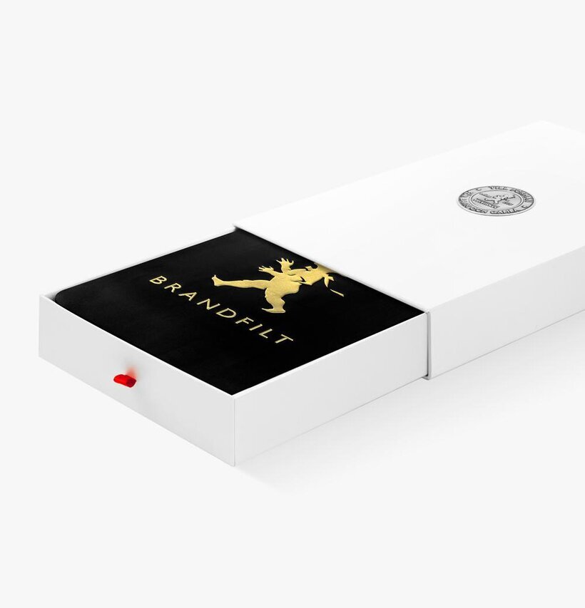 Brandfilt Svart/Guld från Solstickan i vit förvaringslåda