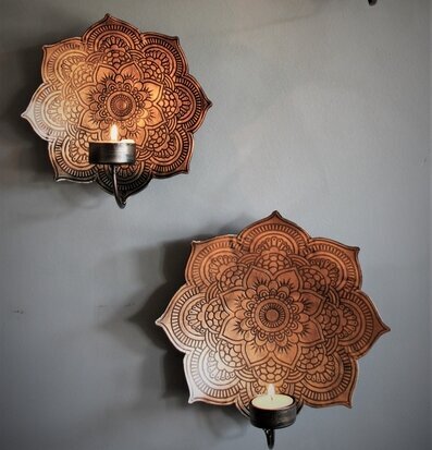 Bild av eleganta väggljushållare med mandalamönster