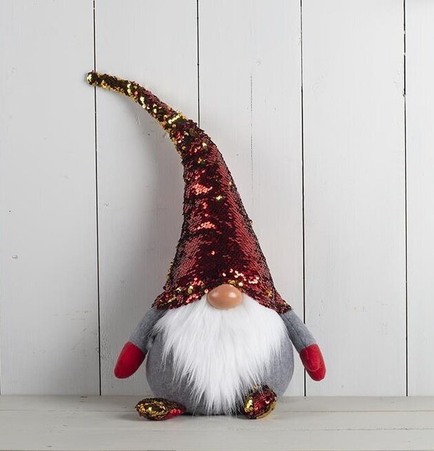 Tomte Paljett från Multi Agentur med röd paljetthatt