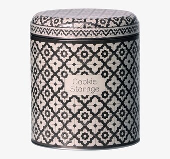 Bild av dekorativ plåtburk med geometriskt mönster