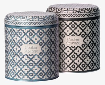 Bild på stilfulla plåtburkar med intrikat mönster