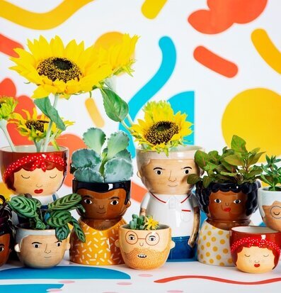 Kruka Mini Rose från Sass & Belle med ansiktsmotiv