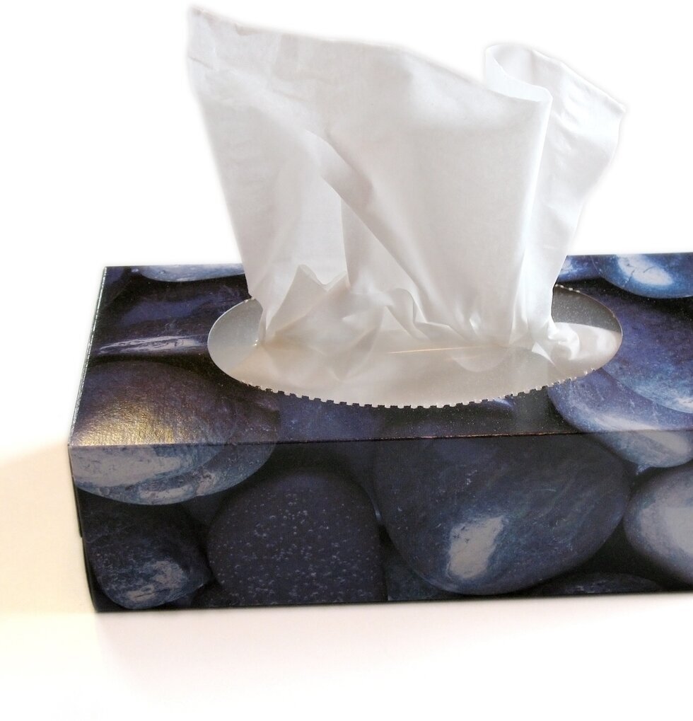 Ansiktsservetter i avlång box från Annat på vit bakgrund