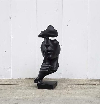 Figurin - Ansikte På Fot av Multi Agentur, svart skulptur