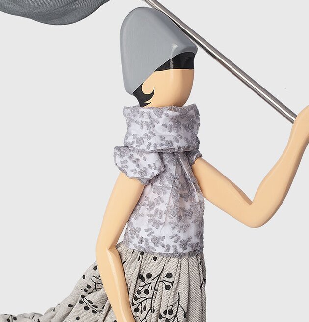 Bordslampa Aigli från Skitso med stiliserad figur och paraply